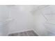 Walk-in closet featuring bright white walls, and metal shelving at 10100 Jacob Pl # 204, Las Vegas, NV 89144