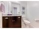 Stylish half bathroom with granite countertops and modern fixtures at 1012 Terron Allen Ave, North Las Vegas, NV 89031