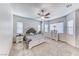 Well-lit bedroom with neutral decor and carpeted floor at 1012 Terron Allen Ave, North Las Vegas, NV 89031