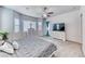 Well-lit bedroom with neutral decor and carpeted floor at 1012 Terron Allen Ave, North Las Vegas, NV 89031