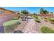 Enjoy the community park featuring a brick path, benches, and trimmed hedges in a Gathering-friendly neighborhood at 1012 Terron Allen Ave, North Las Vegas, NV 89031
