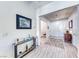 Welcoming foyer features neutral walls, light tile flooring, and stylish decor, creating an inviting entrance at 1012 Terron Allen Ave, North Las Vegas, NV 89031