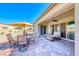 Relaxing covered patio with a seating area, perfect for outdoor dining at 1012 Terron Allen Ave, North Las Vegas, NV 89031