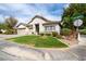 Beautiful single-story home boasting a lush green lawn on a corner lot at 1088 Casady Hollow Ave, Henderson, NV 89012