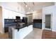 Stylish kitchen featuring an island, modern appliances, and tiled flooring at 1088 Casady Hollow Ave, Henderson, NV 89012