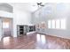 Bright living room with a fireplace and hardwood floors at 1088 Casady Hollow Ave, Henderson, NV 89012