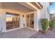 A cozy back patio with dual sliding glass doors at 10955 Sospel Pl, Las Vegas, NV 89141