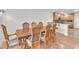 Elegant dining area featuring a large table, comfortable seating, and direct access to the kitchen at 10955 Sospel Pl, Las Vegas, NV 89141