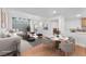 Bright, airy living room featuring modern decor, hardwood floors, and neutral color palette perfect for entertaining at 10955 Sospel Pl, Las Vegas, NV 89141