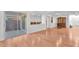 Open floor plan with hardwood floors, sliding door and view of the patio at 10955 Sospel Pl, Las Vegas, NV 89141