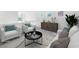 Cozy loft area with stylish furniture, ample natural light, and a comfortable seating arrangement at 10955 Sospel Pl, Las Vegas, NV 89141
