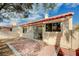 Backyard features a brick patio and access to the interior via a sliding glass door at 1645 Indian Cove Ln, Las Vegas, NV 89128