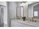 Modern bathroom with double sinks and updated vanity at 1645 Indian Cove Ln, Las Vegas, NV 89128
