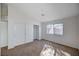 Bright bedroom with a closet and ample natural light at 1645 Indian Cove Ln, Las Vegas, NV 89128