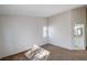 Bright and open bedroom with a glimpse into the bathroom at 1645 Indian Cove Ln, Las Vegas, NV 89128