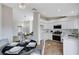 Bright eat-in kitchen features a view into the living room at 1645 Indian Cove Ln, Las Vegas, NV 89128