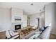 Comfortable living room with hardwood floors, neutral paint, and a modern fireplace at 1645 Indian Cove Ln, Las Vegas, NV 89128