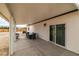 Covered back patio with outdoor seating, perfect for entertaining and relaxation at 1660 W Princeton Cir, Pahrump, NV 89060