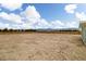 Expansive lot surrounded by a wooden fence, offering privacy and endless possibilities at 1660 W Princeton Cir, Pahrump, NV 89060