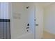 Modern bathroom with a white tub, black fixtures, and a decorative shower curtain at 1660 W Princeton Cir, Pahrump, NV 89060