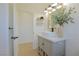 Bathroom featuring a vessel sink, grey vanity, modern fixtures, and stylish decor at 1660 W Princeton Cir, Pahrump, NV 89060