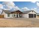 This charming single-Gathering home features a 2-car garage, porch swing, and desert landscaping at 1660 W Princeton Cir, Pahrump, NV 89060