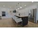 Modern kitchen featuring a large island with seating and stainless steel appliances at 1660 W Princeton Cir, Pahrump, NV 89060