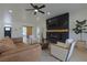 Cozy living room featuring a modern fireplace and stylish decor at 1660 W Princeton Cir, Pahrump, NV 89060