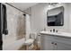Clean bathroom with a shower-tub combo and white marble vanity at 167 Ebb Tide Cir, Las Vegas, NV 89123