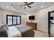 Bedroom with a ceiling fan, wood floors and an open doorway at 167 Ebb Tide Cir, Las Vegas, NV 89123