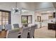 Open dining room featuring modern lighting, stylish decor, and a view of the kitchen at 167 Ebb Tide Cir, Las Vegas, NV 89123