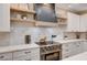 A view of the kitchen including the oven and floating shelving at 167 Ebb Tide Cir, Las Vegas, NV 89123