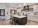 Spacious kitchen island with barstool seating and modern appliances at 167 Ebb Tide Cir, Las Vegas, NV 89123