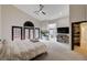 The main bedroom features a ceiling fan, doors leading to the backyard and a walk in closet at 167 Ebb Tide Cir, Las Vegas, NV 89123