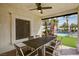 Covered outdoor dining area with views of the pool and landscaped backyard at 167 Ebb Tide Cir, Las Vegas, NV 89123