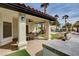 Outdoor kitchen with a built-in grill next to a covered patio at 167 Ebb Tide Cir, Las Vegas, NV 89123
