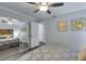 Bedroom with mirrored closet doors and lots of natural light at 1701 E Katie Ave # 51, Las Vegas, NV 89119