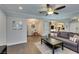 Open-plan living area with view of dining space and modern kitchen appliances at 1701 E Katie Ave # 51, Las Vegas, NV 89119