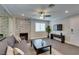 Bright living room offers a stone fireplace and comfortable seating area with contemporary decor at 1701 E Katie Ave # 51, Las Vegas, NV 89119