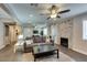 Open living area features a mirrored wall and a view of the modern kitchen at 1701 E Katie Ave # 51, Las Vegas, NV 89119