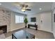 Well-lit living space with modern ceiling fan and stylish furnishings and decor at 1701 E Katie Ave # 51, Las Vegas, NV 89119