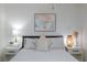 Cozy bedroom featuring a bed with decorative pillows, bedside tables, and modern decor at 1701 E Katie Ave # 68, Las Vegas, NV 89119