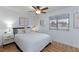 Bright bedroom with a comfortable bed, stylish bedside tables, and a modern ceiling fan at 1701 E Katie Ave # 68, Las Vegas, NV 89119