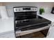 A stainless steel range/oven combo sits on bright countertops at 1701 E Katie Ave # 68, Las Vegas, NV 89119