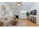 Comfortable living room with contemporary design elements, a ceiling fan, and an entertainment area at 1701 E Katie Ave # 68, Las Vegas, NV 89119