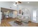 Open-concept living area with modern furnishings, dining space, and natural light at 1701 E Katie Ave # 68, Las Vegas, NV 89119