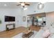 Open-concept living space with modern appliances, dining area, and cozy sofa at 1701 E Katie Ave # 68, Las Vegas, NV 89119