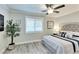 This bedroom features a large window and a lovely decorative tree at 1701 E Katie Ave # 9, Las Vegas, NV 89119