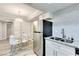 Bright kitchen features stainless steel appliances, granite countertops and breakfast table at 1701 E Katie Ave # 9, Las Vegas, NV 89119