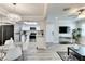 Open-concept living space seamlessly integrates a kitchen, dining area, and living area with natural light at 1701 E Katie Ave # 9, Las Vegas, NV 89119